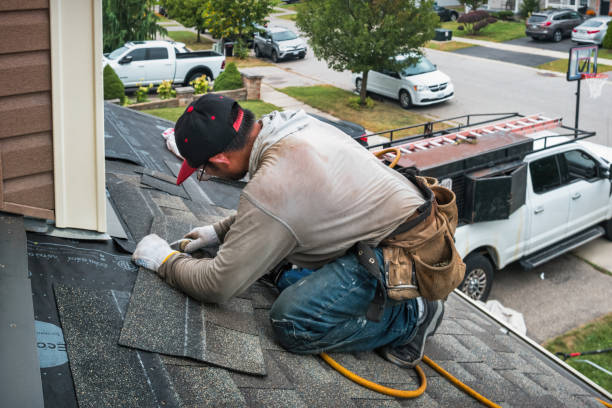 Professional Roof Replacement technician working in Loogootee, IN